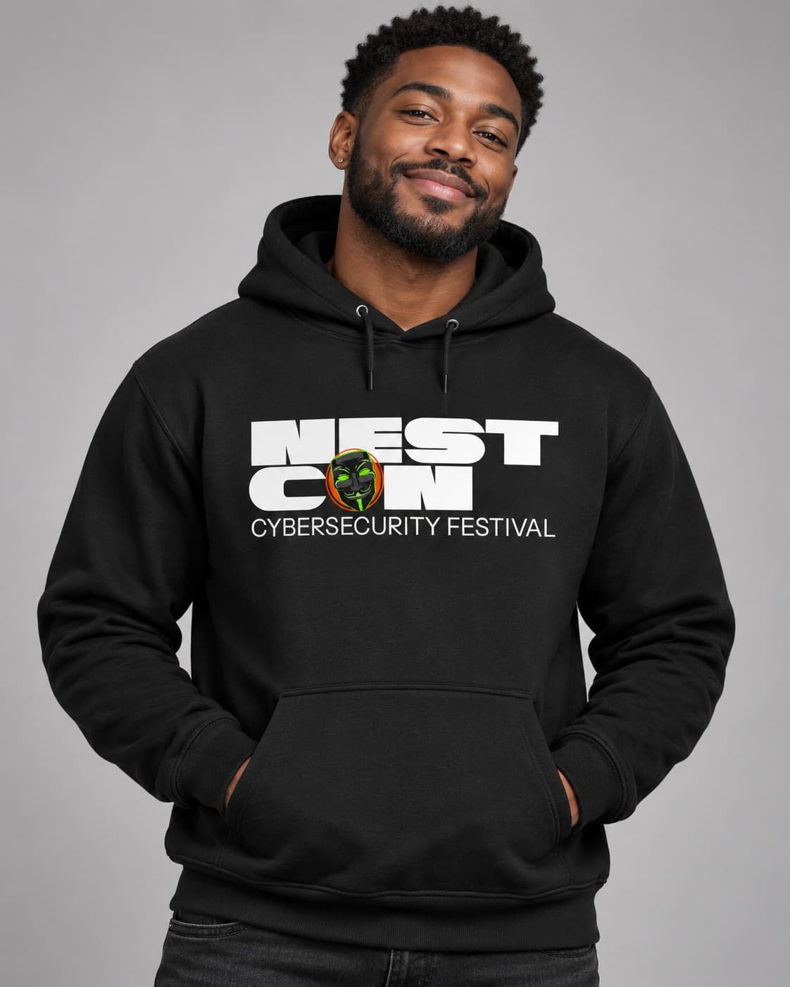 Black pullover hoodie with the white NESTCON cybersecurity festival logo, shown worn with the front design visible.